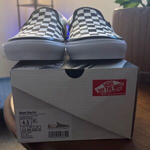 Vans Black and White Checkerboard Skate Slip-Ons